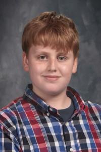 student with striped shirt