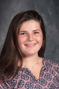 student with long black hair