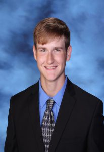 student with suit and tie