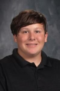 student with combed hair