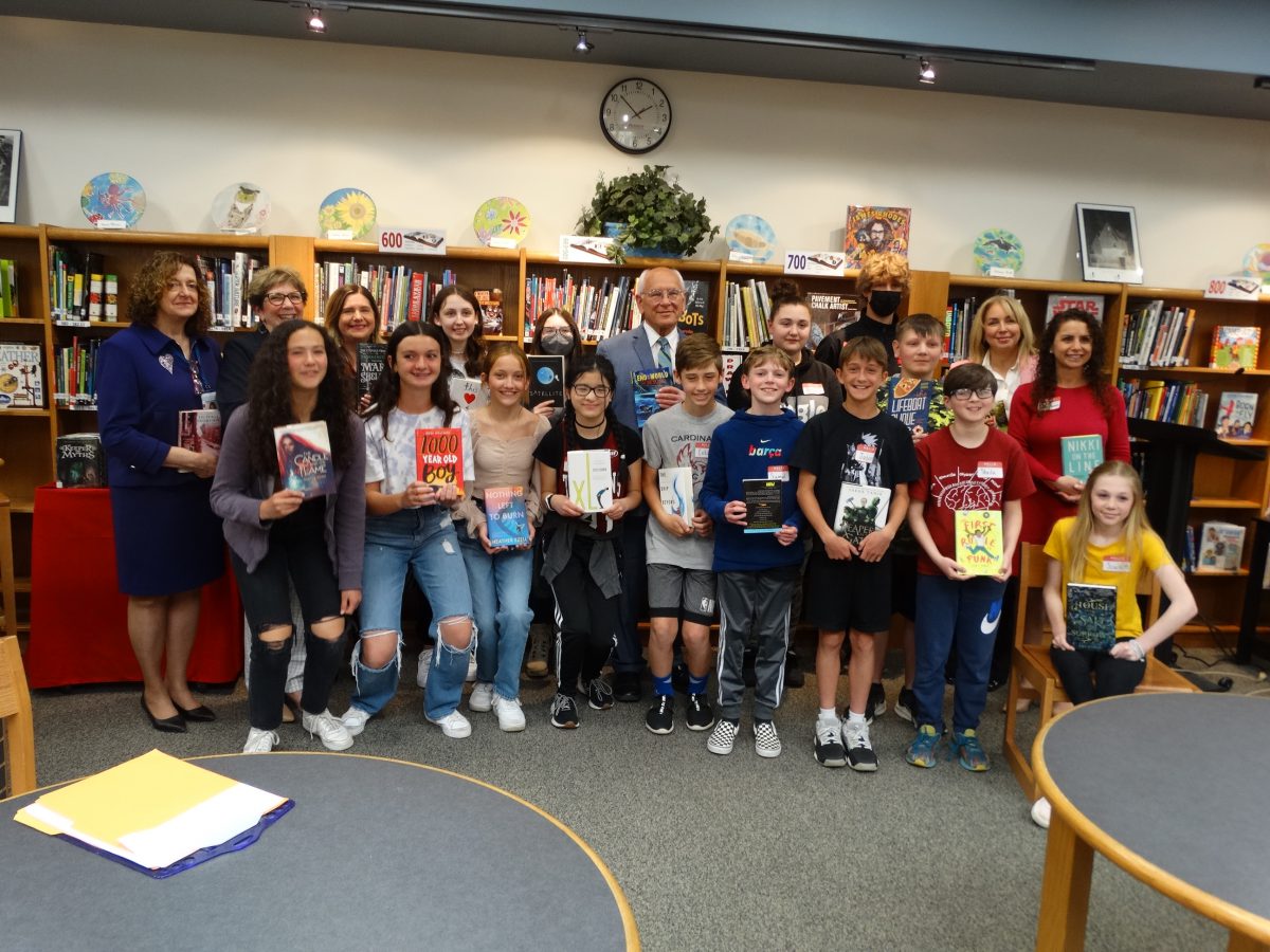 Congressman Paul Tonko meets with grades 6, 7 and 8 students, donates books to Middle School LMC