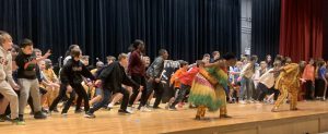 students dancing on stage