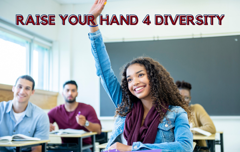 students in class - one raising her hand