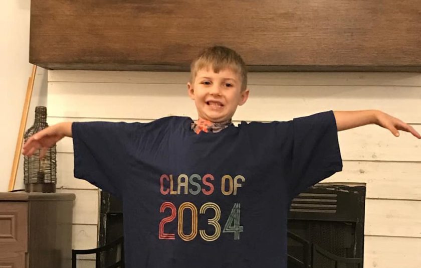 students wearing an oversized shirt for class of 2034