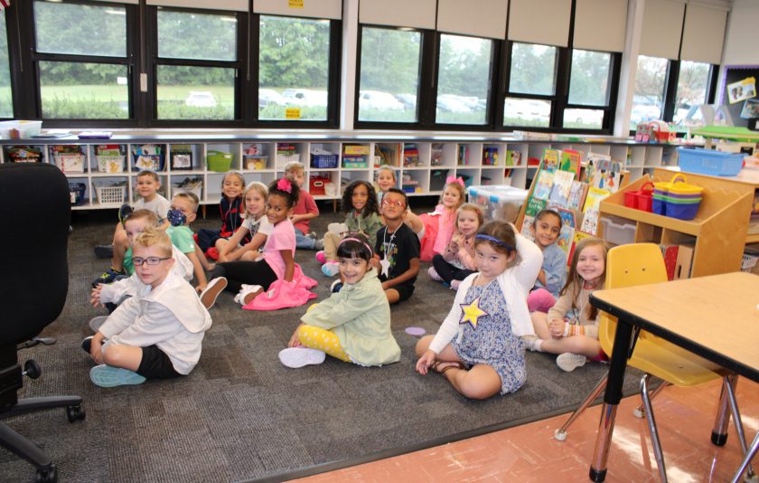 studnets sitting on floor during reading time