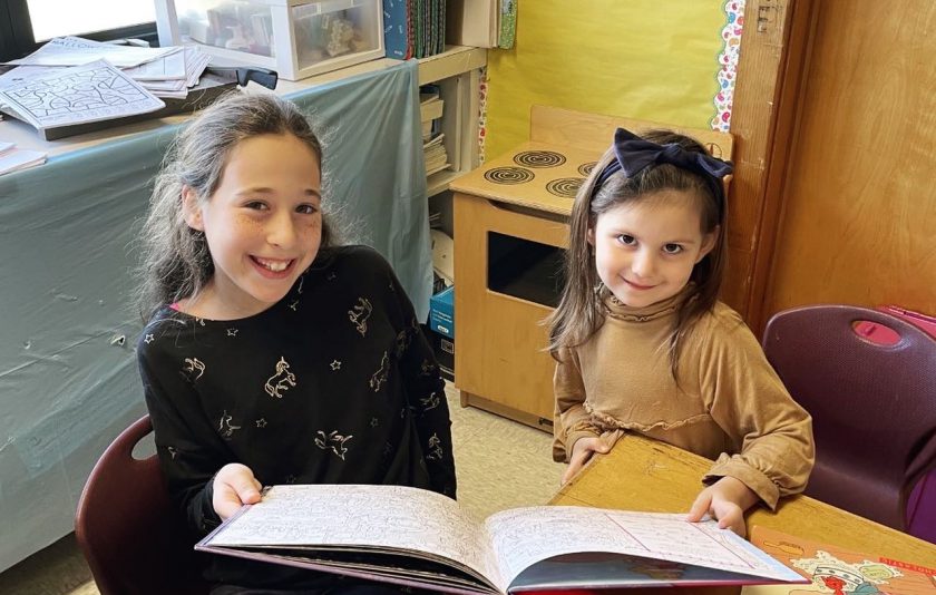 two young students reading