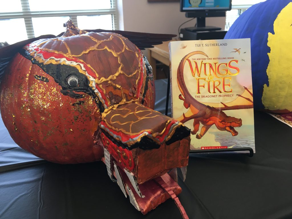 Dragon head made out of a pumpkin