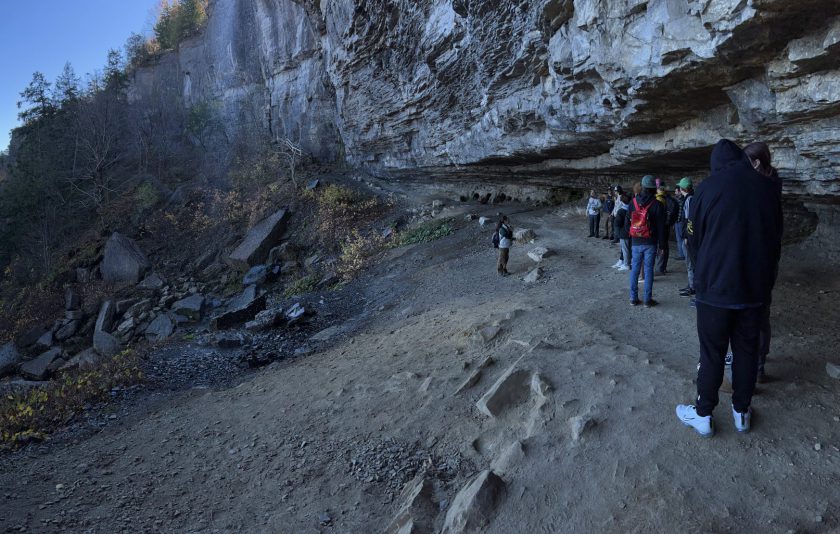 students at Thacher Park under rocks