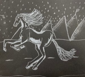 A horse prancing with its front legs up and hair blowing in the wind sketched with a white pencil on black paper. Snow is falling and there are pointy mountains in the shape of a triangle