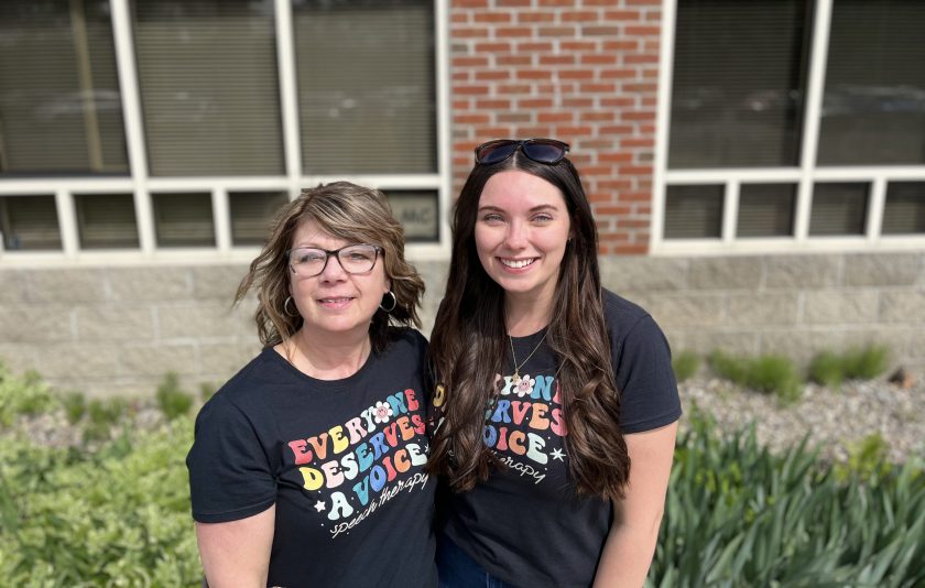 two women wearing shirts that say everyone deserves a voice