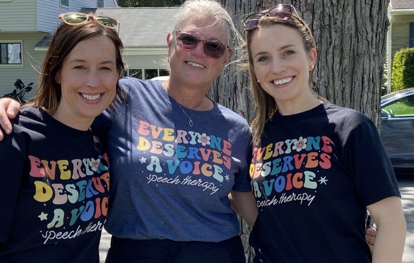 three women wearing shirts that say everyone deserves a voice