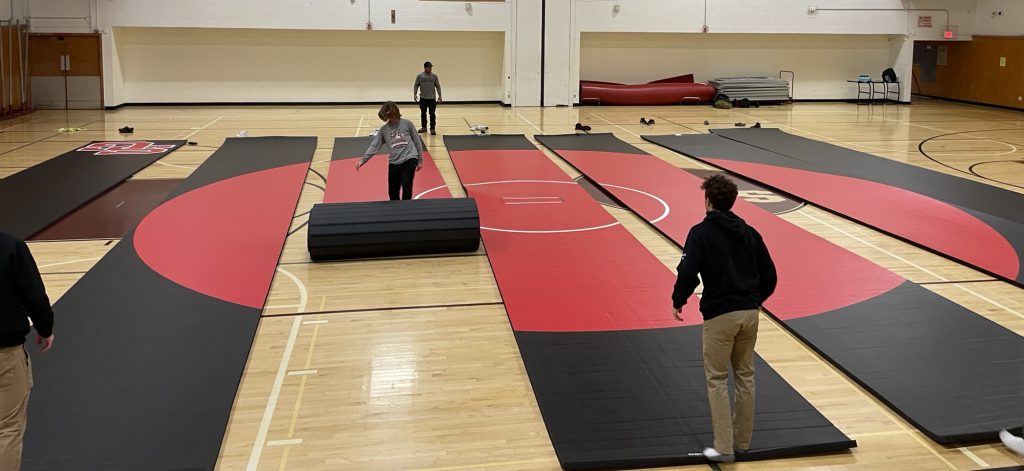 wrestling team rolling out new mats