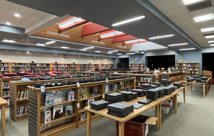 library organized with books and chromebooks
