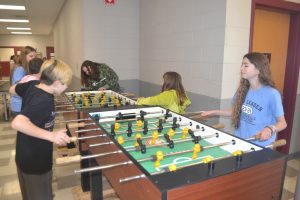 students playing foosball