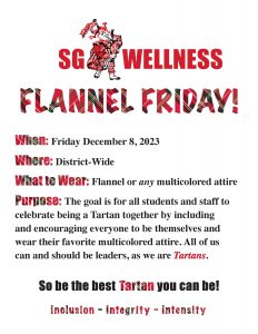 a sign telling people to wear flannel to school on Friday, December 8.