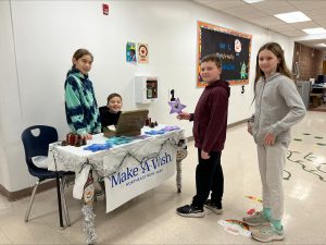 students buying stars from other students for Make a Wish