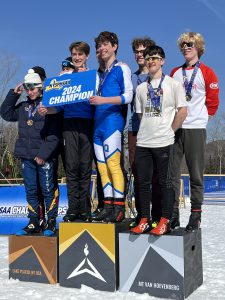 skiers on podium