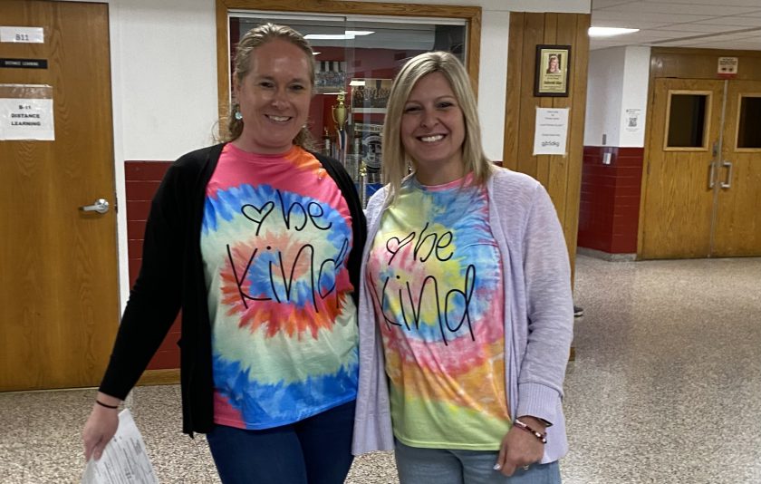 two teachers wearing tie-dye shirts