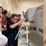 student putting windmill together