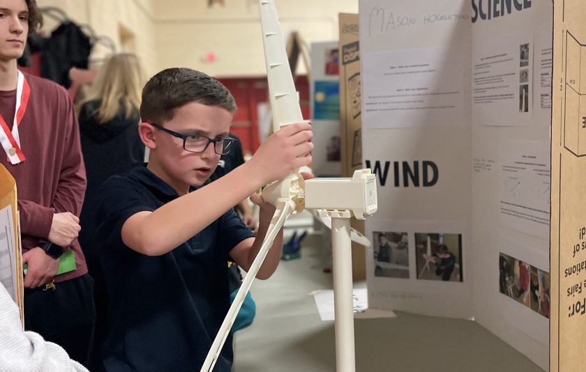 student putting windmill together